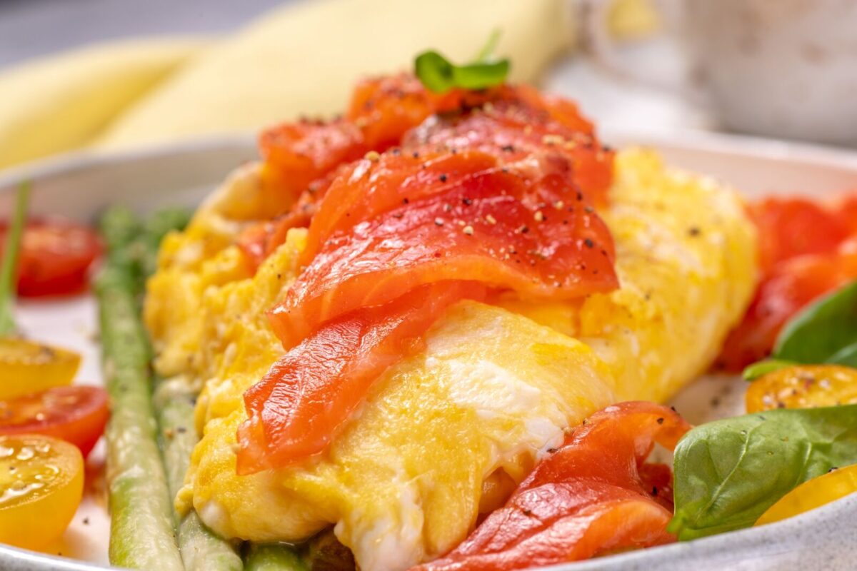 An omelet with vegetables and salmon.